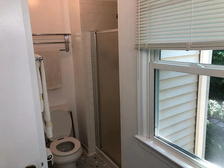 Master bedroom bath looking a toilet and shower