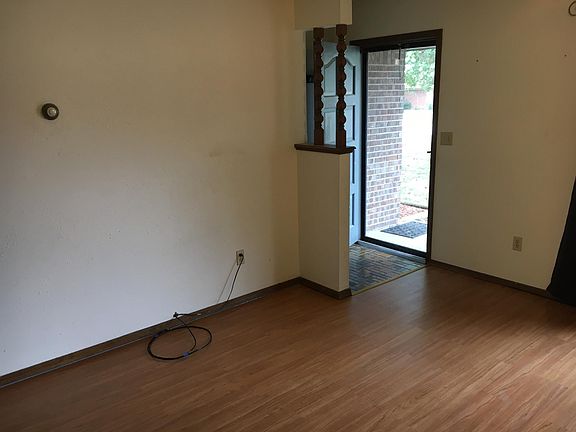 view of front room looking to the main entrance to the house.