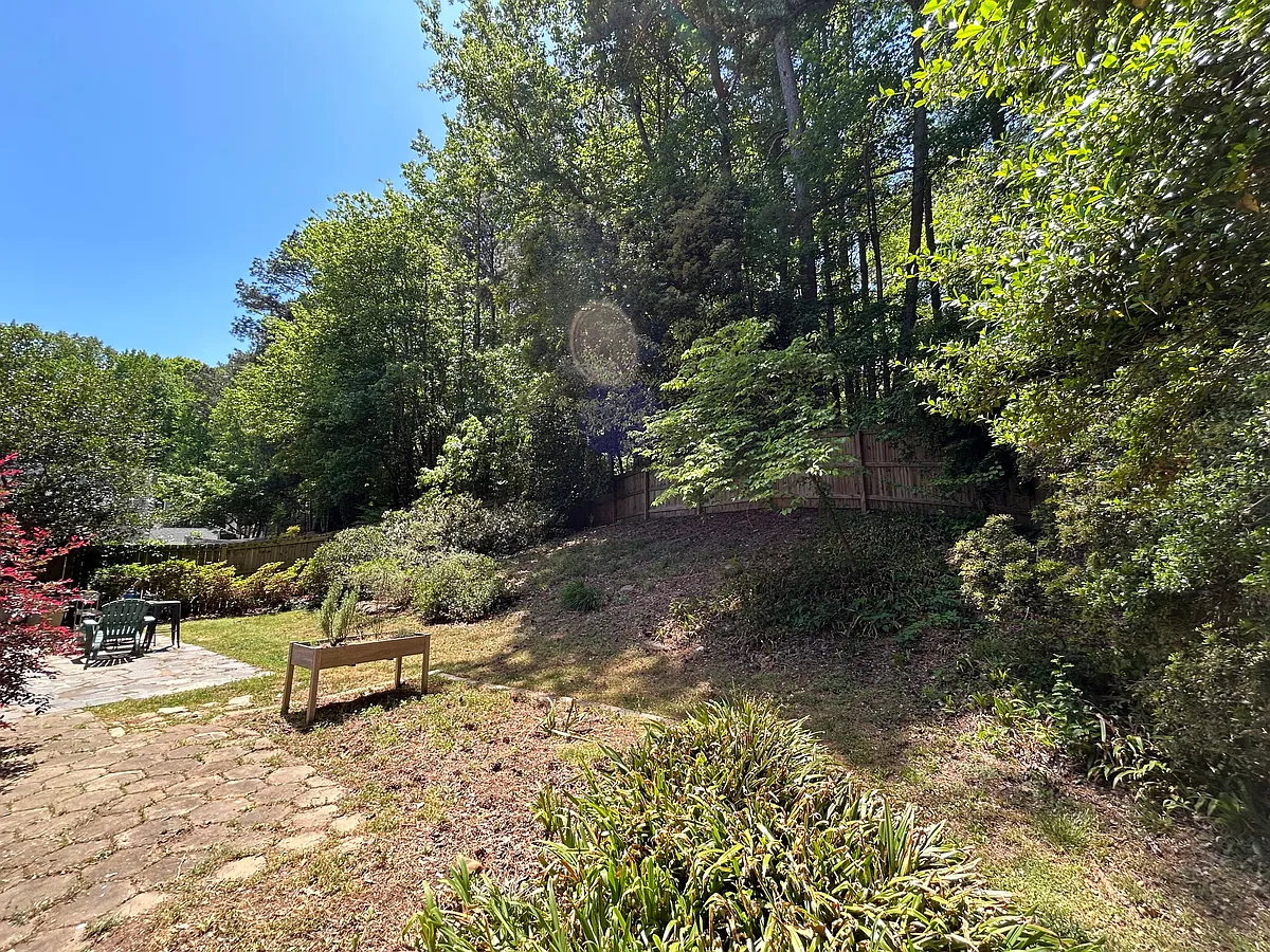 Generous fenced backyard with excellent exposure welcomes gardeners (and keeps out any wildlife). - 520 S Kimberly Ct