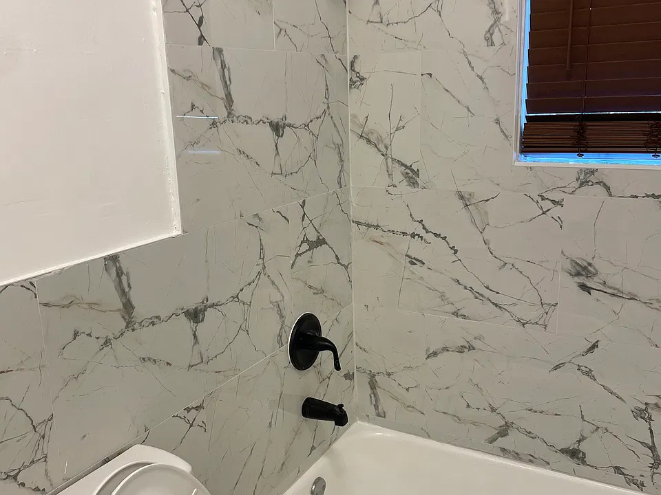 Porcelain Tile throughout bathroom