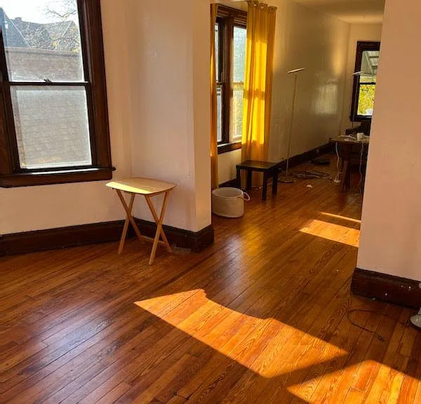 Dining room with chandelier, view towards living room