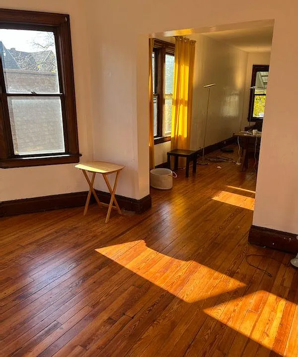 Dining room with chandelier, view towards living room