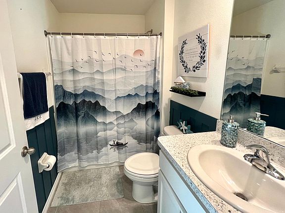 Guest Bathroom with tub.