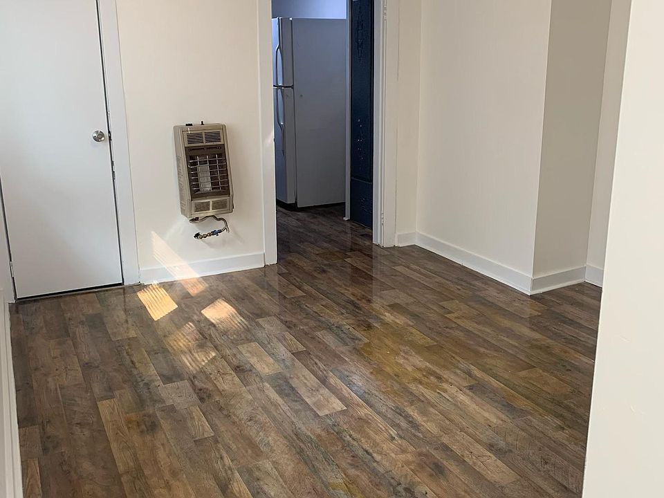 From the hallway, a den that can be used as a study, dining, or all purpose area. The bathroom is off of this room.