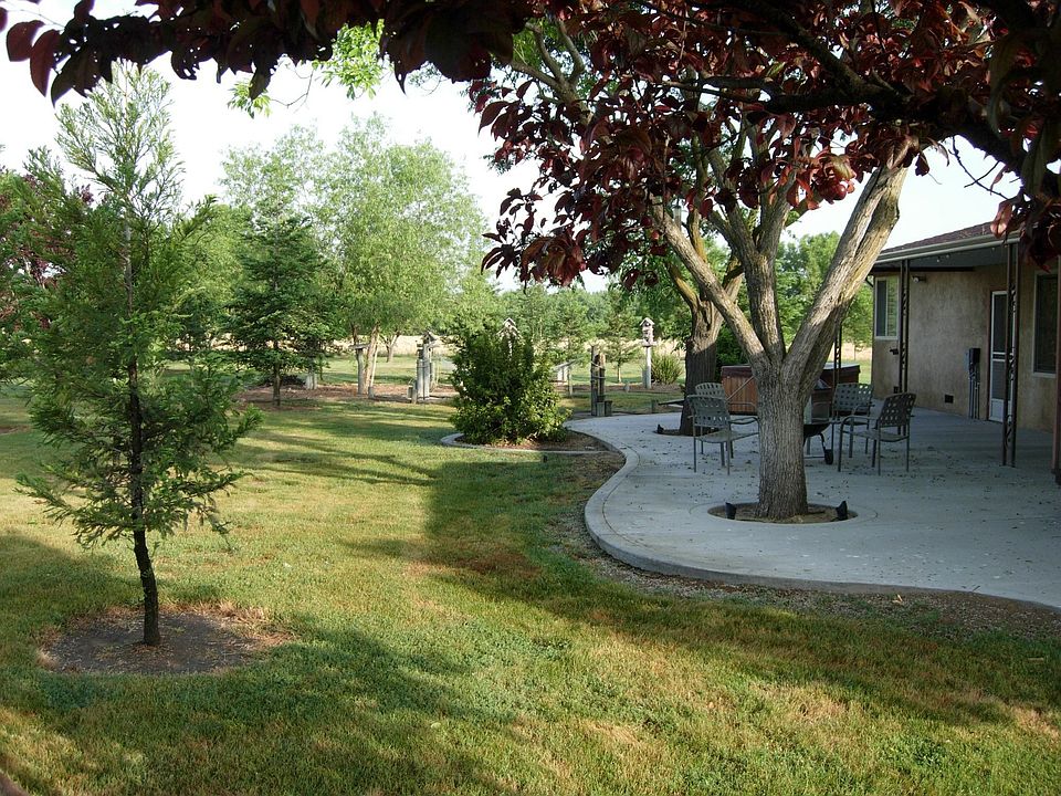 1300 sqft patio behind larger home