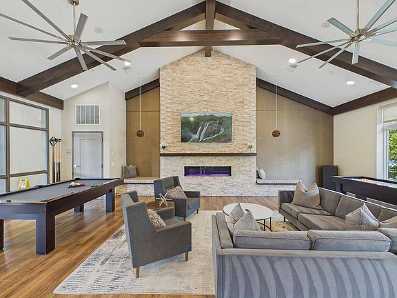 Kick back by the fire or challenge a neighbor to a game in this warm, welcoming clubhouse retreat.