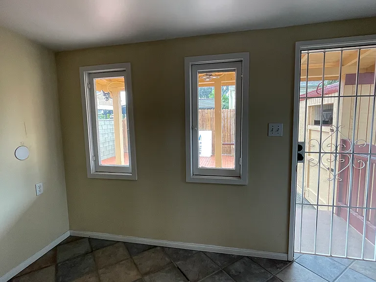 laundry room den leading to the backyard