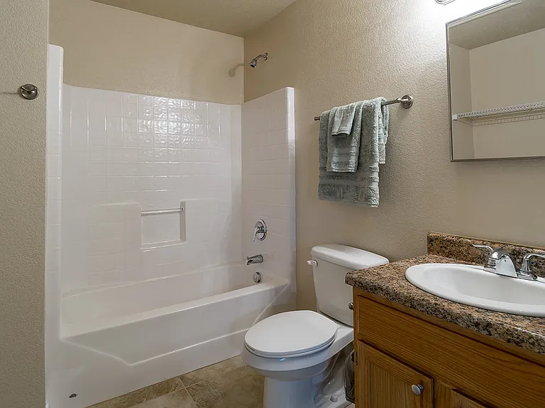 The second bath has hookups for your full sized washer and dryer