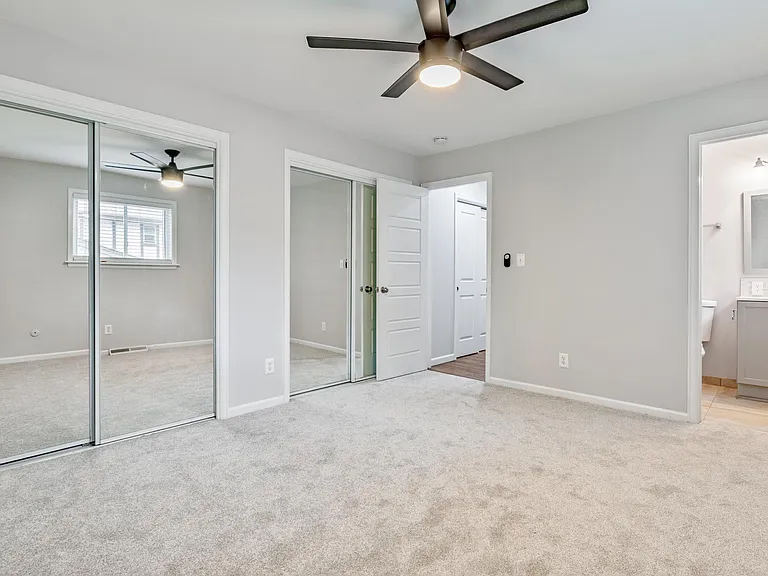Master bedroom with two large closets