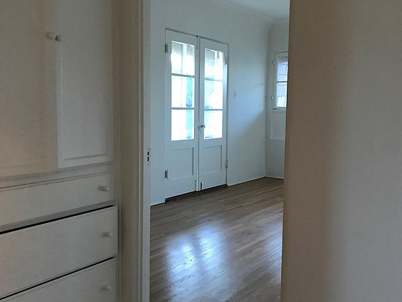 Upstairs bedroom with patio.