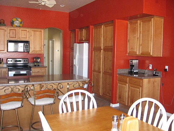 Knotty alder cabinets and quartz countertops