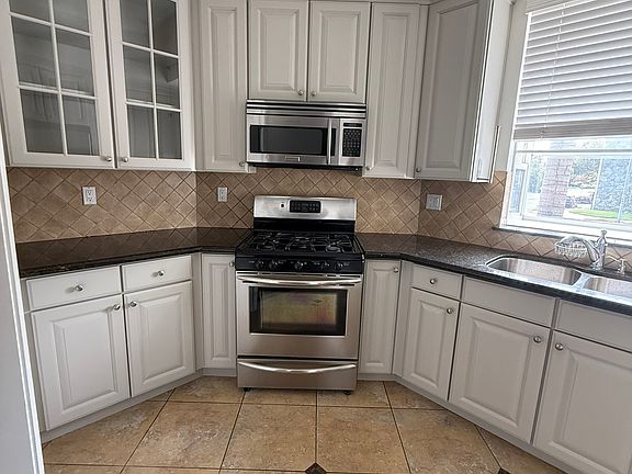 Kitchen with Freshly Painted Cabinetry
