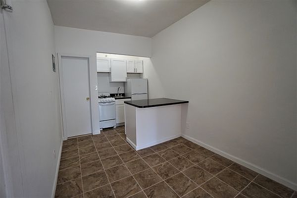 2nd image of 213 E 11th St APT 3A