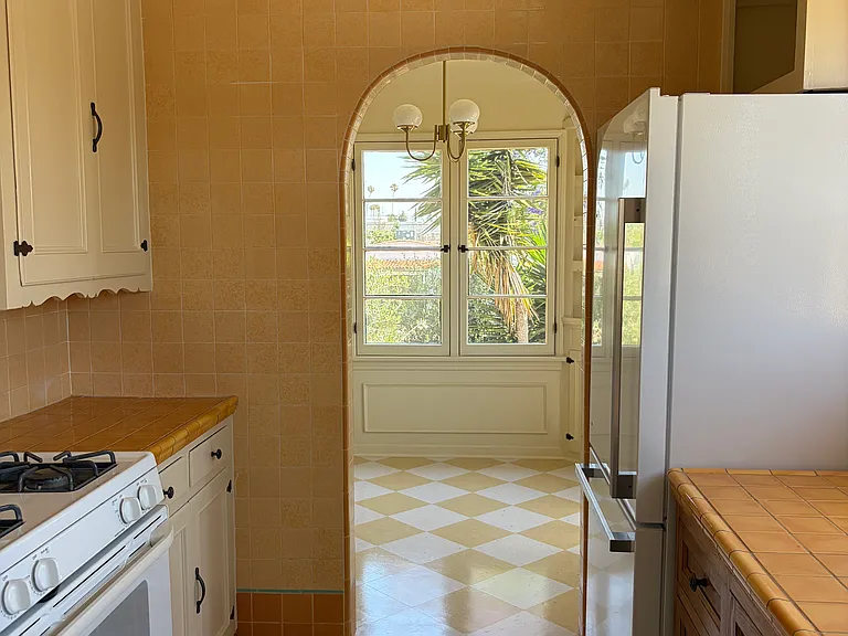Kitchen looking into the breakfast nook