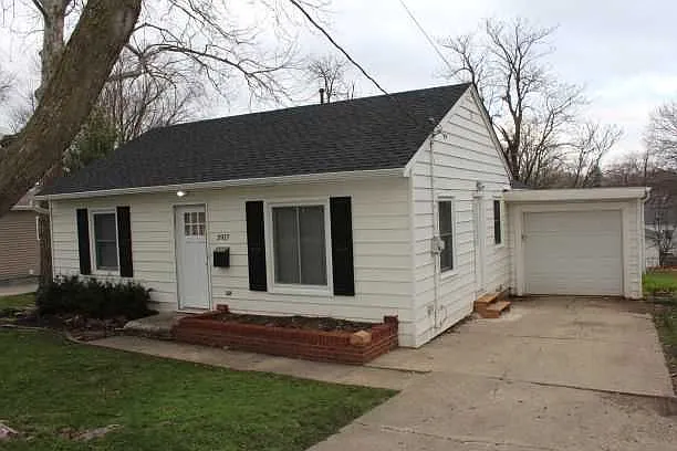 Front exterior of home and attached garage