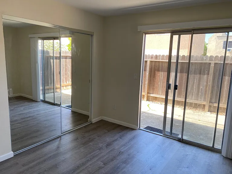 Bedroom (again) leads to back patio