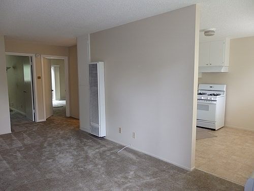 Living room with view of kitchen