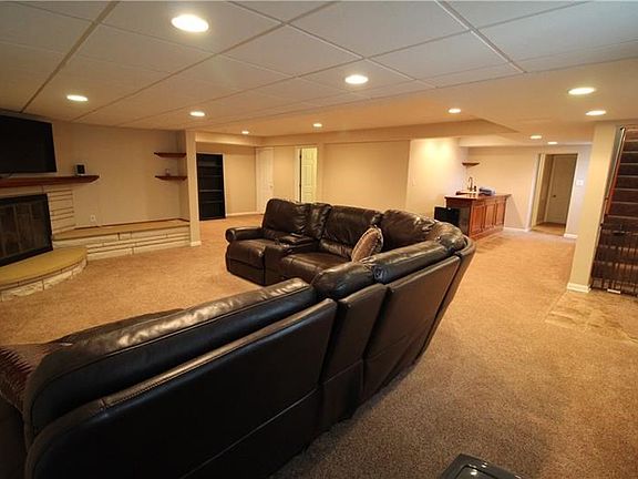 The full finished lower level offers opportunity for an in-law or teen suite, or awesome space for entertaining in comfort and c