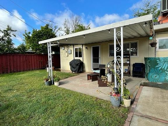 Large Backyard with covered patio.