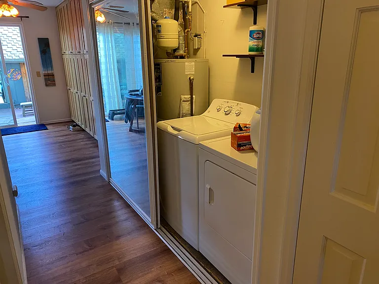 new washer and drier. More storage to the right in the closet.