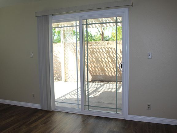 Two new double pain sliding glass doors. One in the kitchen to the backyard and another in the family room to the backyard.