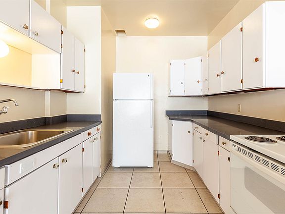 Eat in kitchen with period details and freshly painted cabin