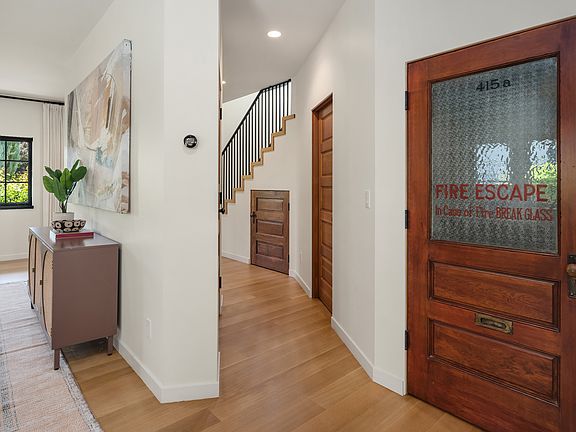 ...to curated vintage doors reclaimed from iconic Seattle landmarks, each whispering a story of the past. This fire escape door is from the 1920s University of Washington.
