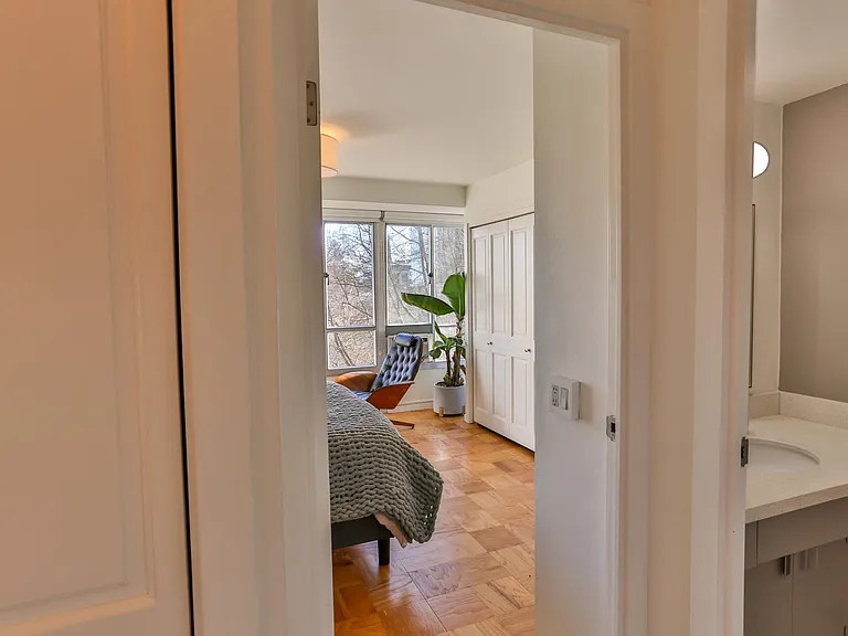 Off the entry way and next to the bathroom is the bedroom.