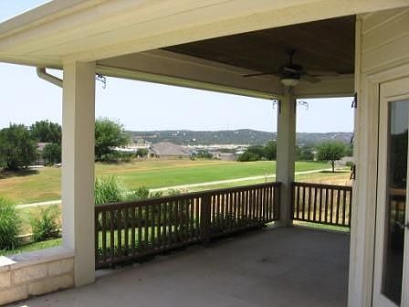 Covered Patio Extends Off Master Bedroom for Outdoor Sitting Area
