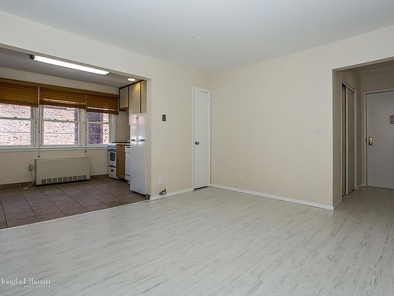 5th image of 215-225 West Broadway