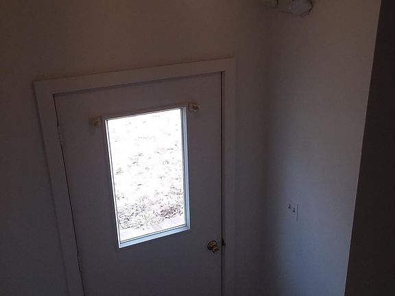 ENTRY DOOR BEFORE STAIRS, NEW EMERGENCY LIGHTING THROUGHOUT, NEW PAINT