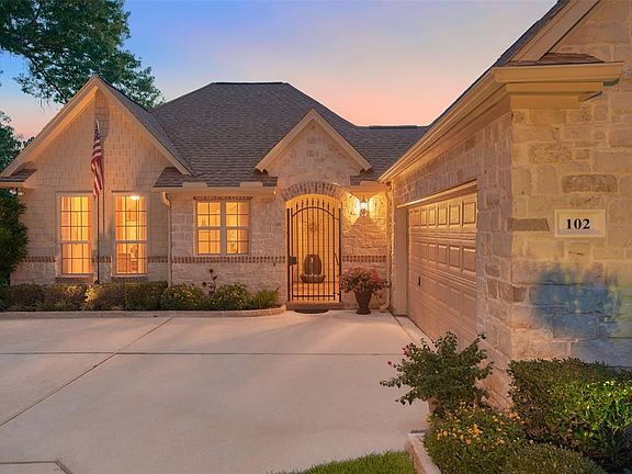 Drive up to the over-sized 2 car garage with epoxy flooring and workshop.