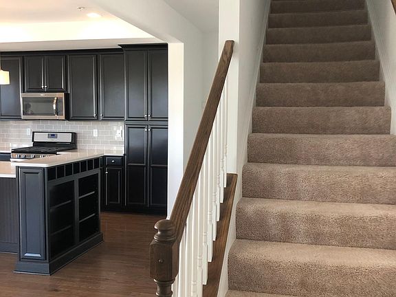 Stairs leading upstairs to master bedroom + 2 more bedrooms