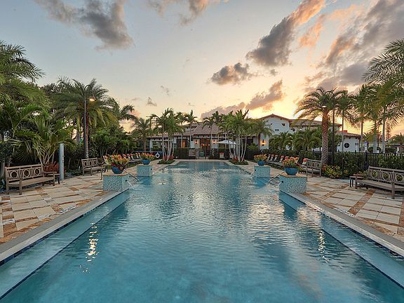 The beach entry resort style swimming pool is the perfect spot to cool down.