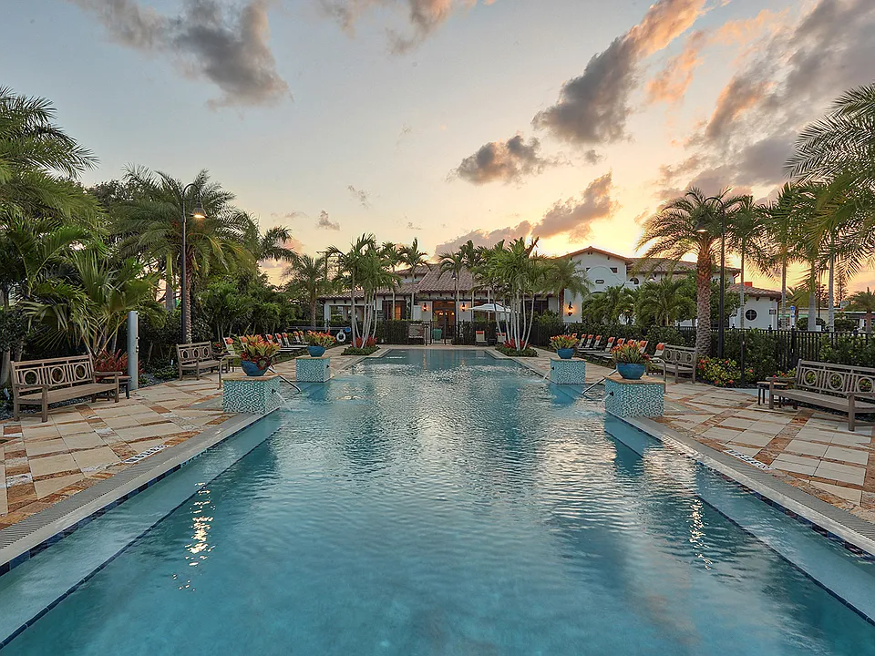 The beach entry resort style swimming pool is the perfect spot to cool down.