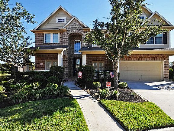 Curb appeal beyond measure with front and back porches!