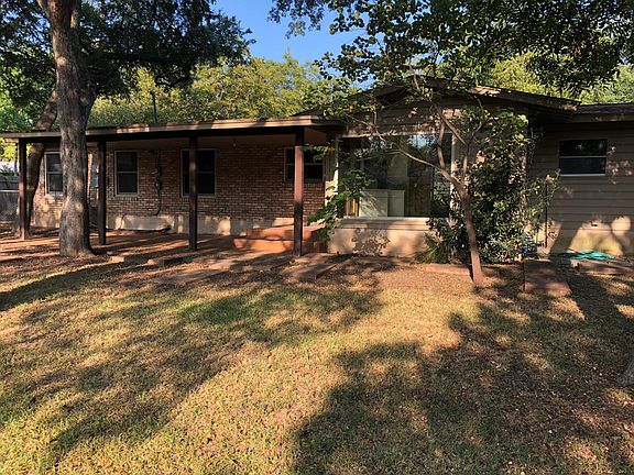 Fenced and shaded backyard