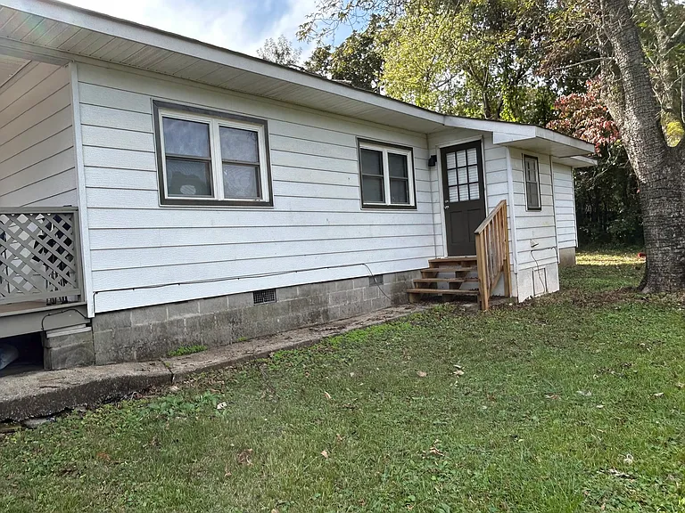 Back of House and Outside Door to the Laundry Room