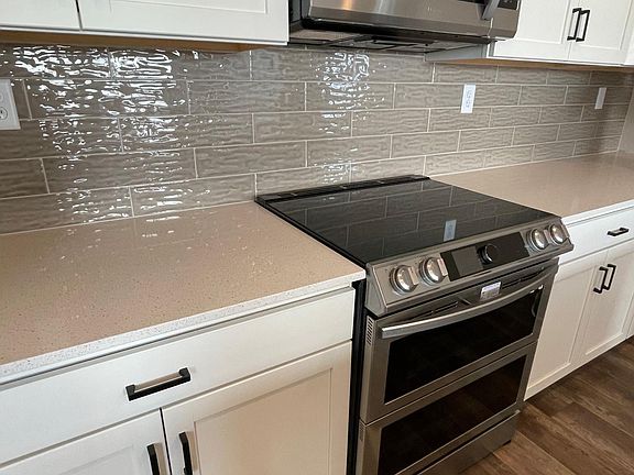 Spacious kitchen with induction stove top