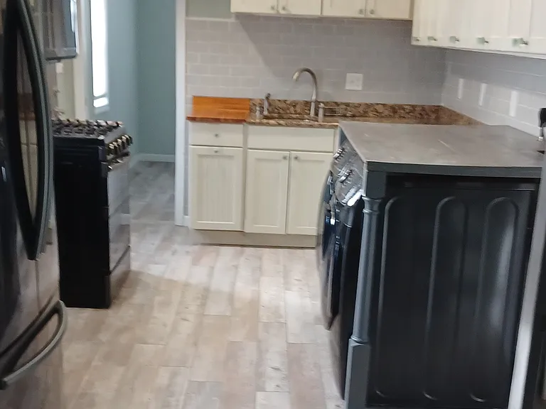 View from living area to bedroom.