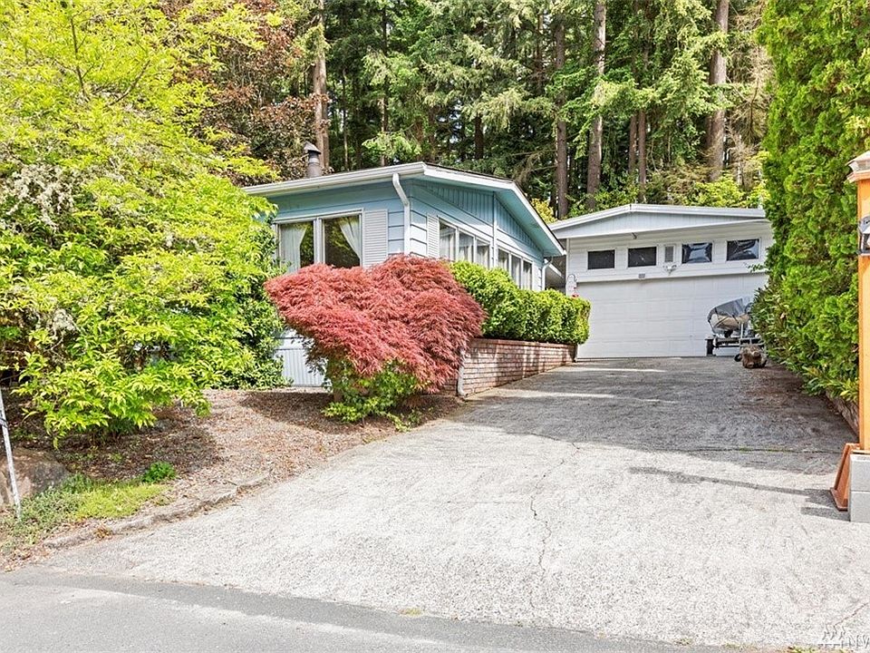 Home sits off street with ample parking and detached garage.