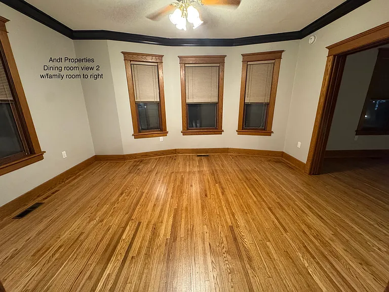 Dining or family room with original oak floors, newly refinished
