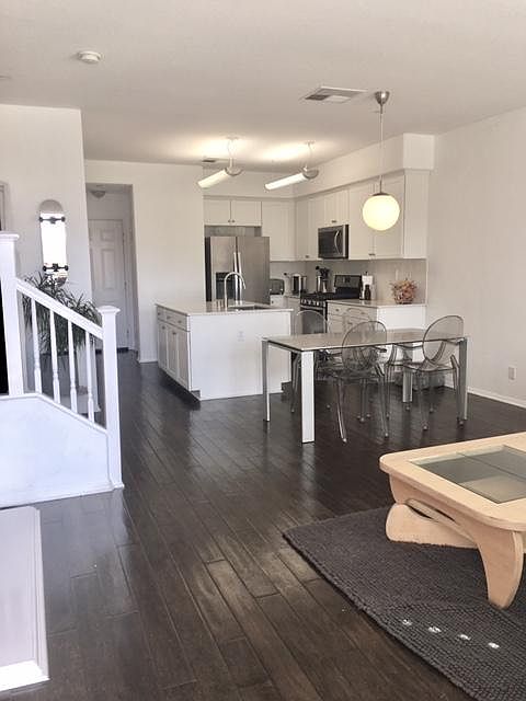 REMODELED KITCHEN AND LIVING ROOM