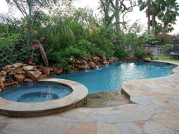 AWESOME BACK YARD, COVERED PATIO, POOL, SUMMER KITCHEN,AND EXTRA YARD FOR MY PLAYING