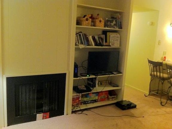 Fireplace and Built-In Bookshelf