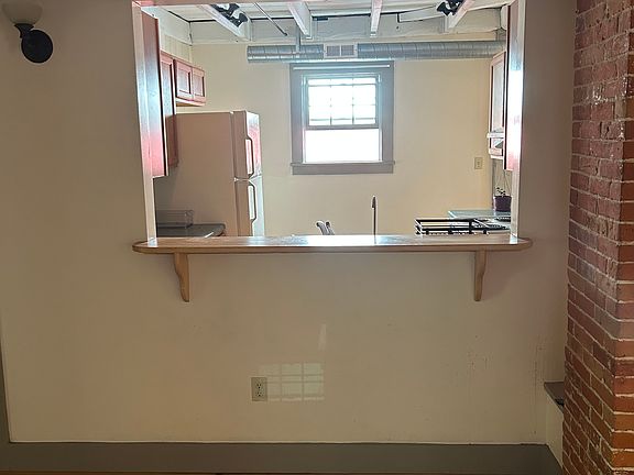 Pull bar stools up to the kitchen.