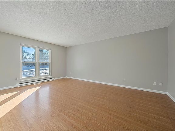 Large Living room with beautiful natural light.