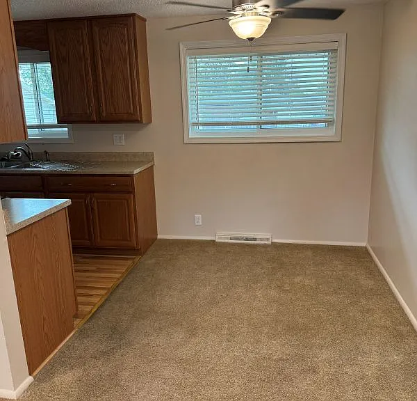 Dining room next to kitchen and living room