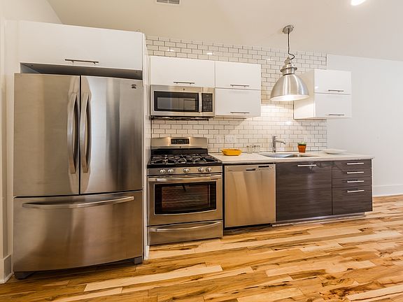 Top end; granite, stainless fridge, stove, dishwash, disposa