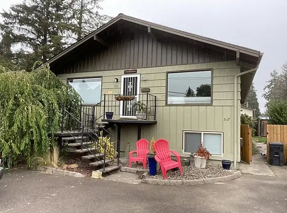 Front view of property and upstairs duplex entrance